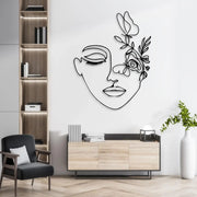 Beauty-themed abstract metal wall décor for living room