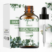 Eucalyptus essential oil bottle with fresh eucalyptus leaves