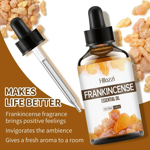 Frankincense essential oil bottle with plant leaves