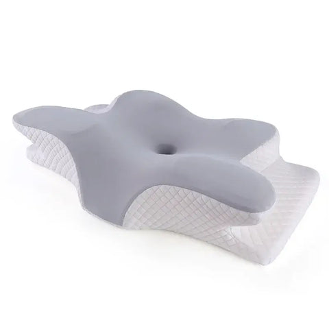 Ergonomic memory foam pillow supporting neck and spine