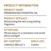 Frankincense essential oil bottle with plant leaves