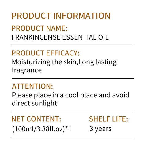 Frankincense essential oil bottle with plant leaves