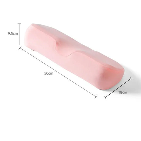 Memory foam cervical pillow for spinal alignment