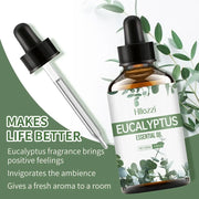 Eucalyptus essential oil bottle with fresh eucalyptus leaves