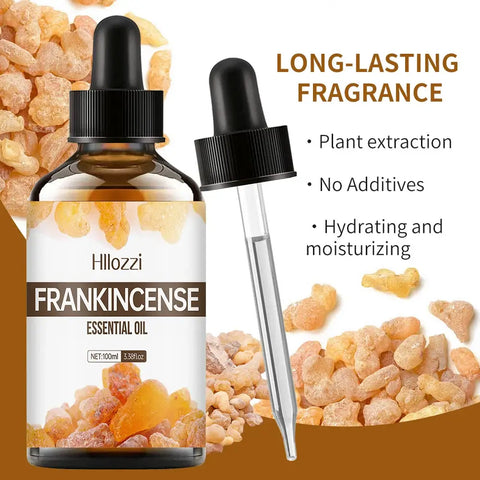 Frankincense essential oil bottle with plant leaves